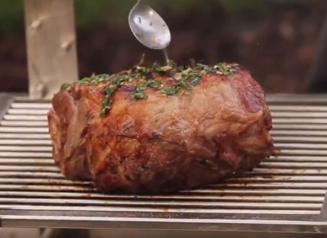 Leg on grill with herb mixture
