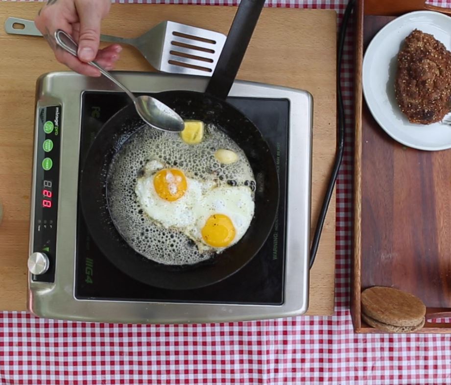 Fried eggs with herb butter