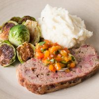Plated Lamb and goat bacon meatloaf
