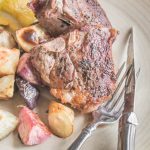 cooked grass fed lamb or goat loin chops with roasted root vegetables