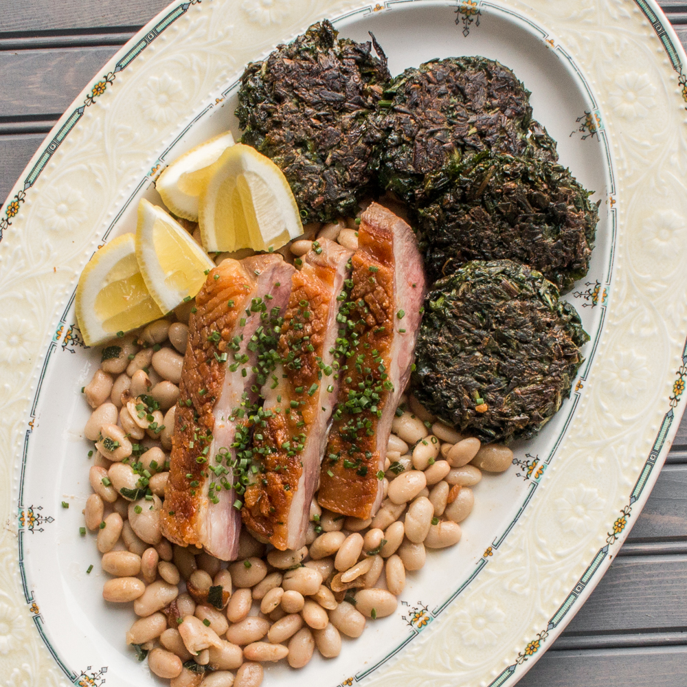 Roast Rack of Goat Recipe with Green Cakes and Beans