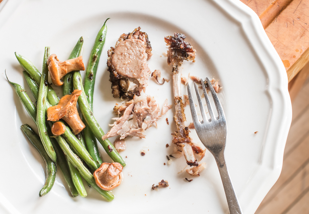 Slow roasted rack of goat with green beans and mushrooms