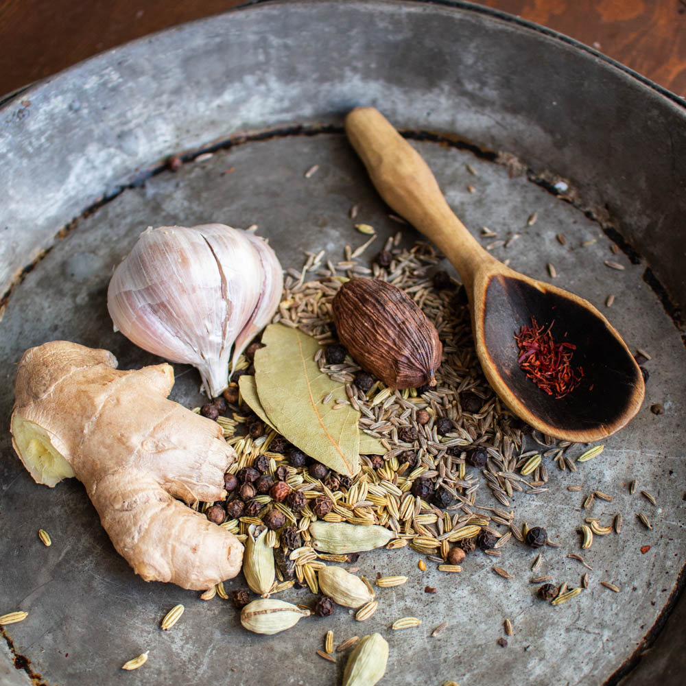ginger, black cardamom, saffon, bay leaves and other spices