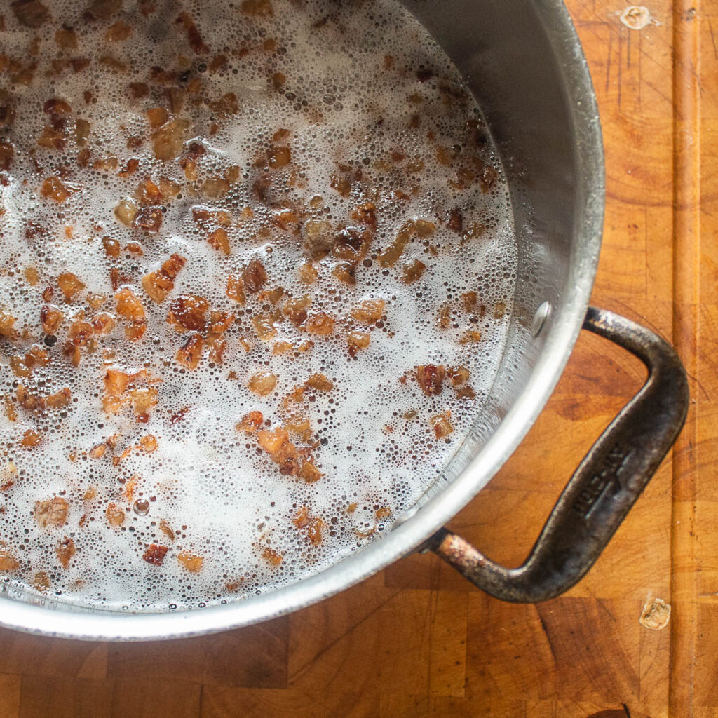 Lamb or goat fat cap chicharrones in gaujillo sauce recipe (chiccharones de borrego)
