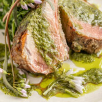 Spring goat chops with foraged greens and ramp leaf butter