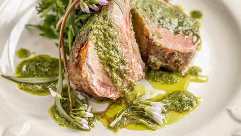 Spring goat chops with foraged greens and ramp leaf butter