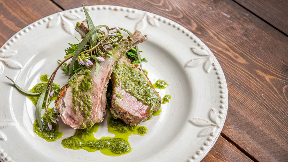 Spring goat chops with foraged greens and ramp leaf butter