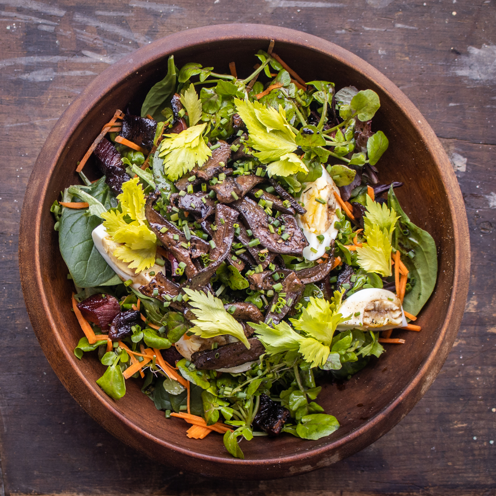 Salted lamb liver salad with balsamic vinegar and eggs