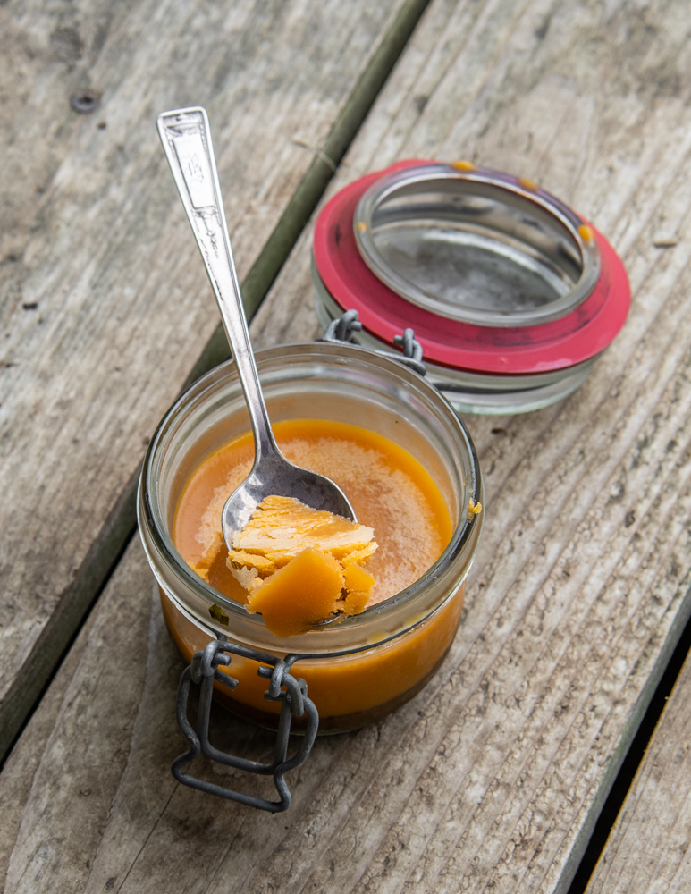 Rendered lamb fat flavored with harissa paste 