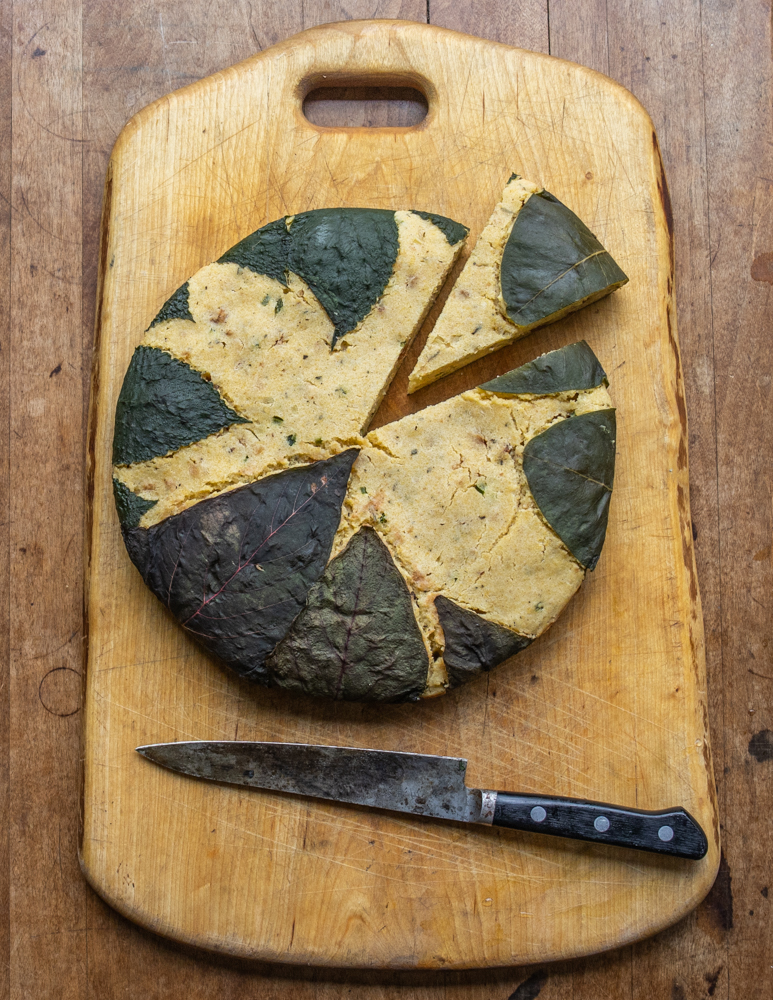 Lamb crackling cornbread wrapped in wild leaves