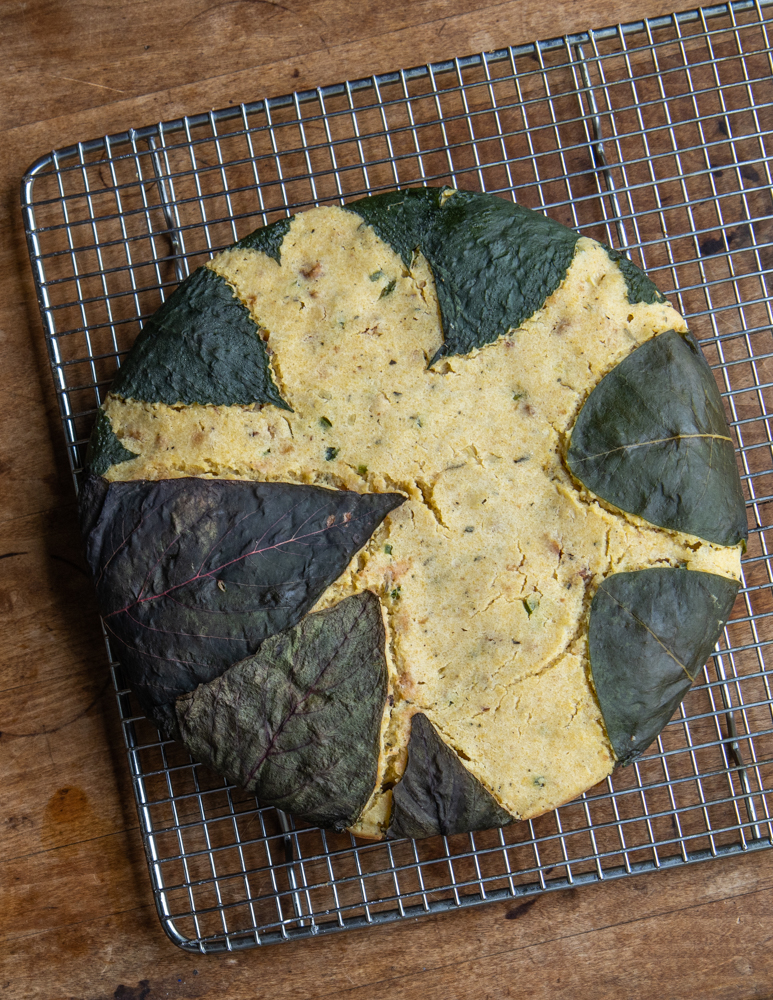 Lamb crackling cornbread wrapped in wild leaves