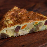 A traditional lamb tortilla sacromonte made with lamb brains and testicles
