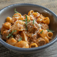 Lamb Sunday Gravy with lamb Italian sausage, tongue and saratoga roast
