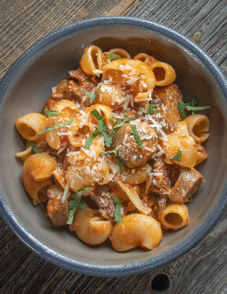 Lamb Sunday Gravy with lamb Italian sausage, tongue and saratoga roast
