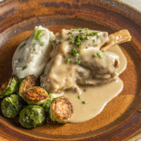 Lamb shanks with white wine garlic sauce
