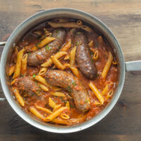 Slow cooked lamb or goat Italian sausages with pasta