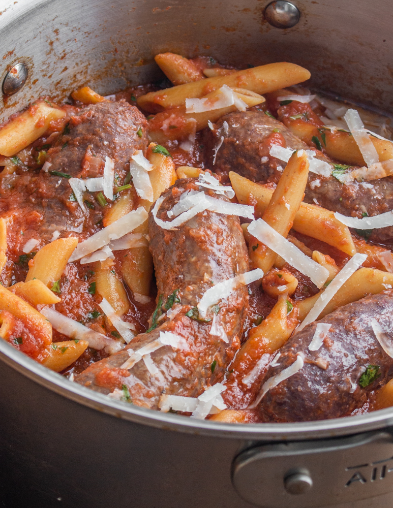 Slow cooked lamb or goat Italian sausages with pasta
