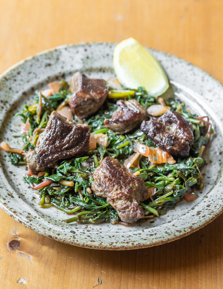 Goat Tsigarelli with purslane, watercress, and amaranth