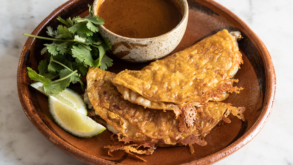 Smoked goat neck birria tacos