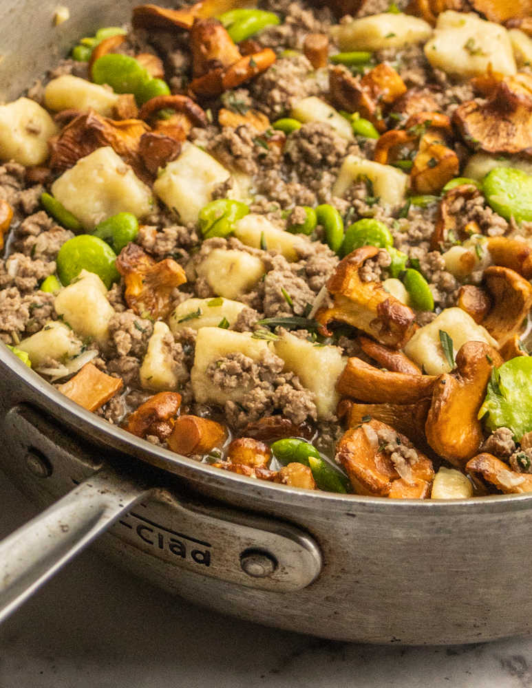 Goat gnocchi with chanterelle mushrooms, fava beans and savory